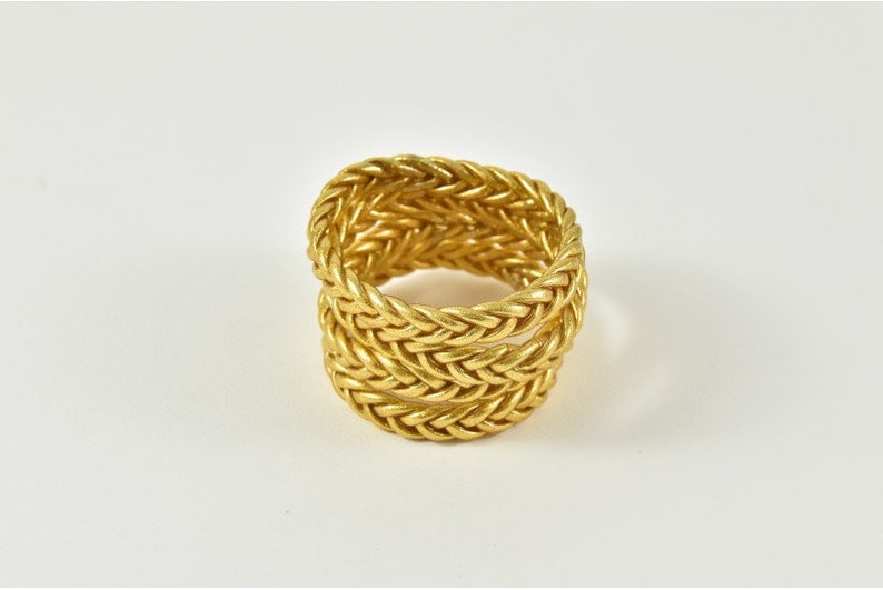 Brazalete budista trenzado en oro claro imagen 1