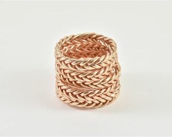 Braided champagne Buddhist bangle