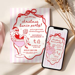 May include: A Christmas Bunco Party invitation and a smartphone displaying the same design. The invitation features a red and pink color scheme with the text "Christmas Bunco Party!" and event details. The design includes a woman in a cocktail glass.