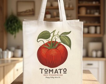 Arte inspirado en un paquete de semillas de tomate vintage en un bolso de algodón. Este bolso bandolera ecológico es práctico y elegante, perfecto para el uso diario.