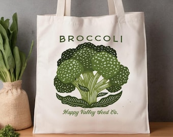 Arte inspirado en paquetes de semillas vintage en un bolso de algodón. Este bolso bandolera ecológico es práctico y elegante, perfecto para el uso diario.