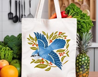 Estampado Blue Jay inspirado en Audubon en un bolso de algodón. Este bolso de hombro ecológico es un práctico bolso de compras para todas tus necesidades diarias.