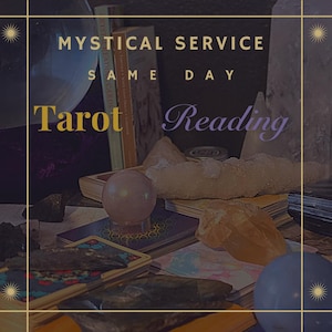 May include: Mystical Service Same Day Tarot Reading. A close-up of a tarot card reading set with crystals, a crystal ball, and a book.