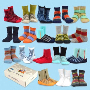 May include: A variety pack of colorful striped socks for kids. The socks are in a variety of colors, including blue, red, green, yellow, and orange. The socks are arranged in pairs and are displayed on a light blue background. The socks are labeled "Teenie Kids".