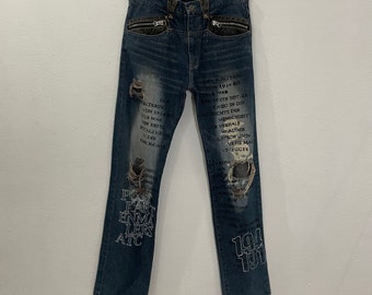 Vaqueros vintage en el ático Vaqueros vintage en el ático con calaveras Vaqueros vintage desgastados Vaqueros vintage de diseñador japonés W32