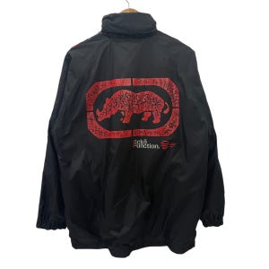 May include: Black windbreaker jacket with a red rhino logo and the text "ecko unction." on the back.