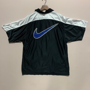 ヴィンテージ 90年代 ナイキ Tシャツ ヴィンテージ 90年代 ナイキ スペルアウト ビッグロゴ ジッパーアップ ジャージー Tシャツ サイズ L