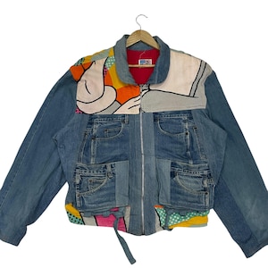 Vintage Looney Tunes Warne Bros Rasse Jeansjacke Vintage 90er Jahre Looney Tunes Warne Bros Rassen Jeansjacke Gr. XL