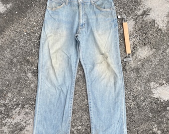 Vaqueros Wrangler Wrangler vintage desgastados, talla W33