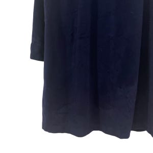May include: A navy blue long-sleeved dress with a simple, elegant design.
