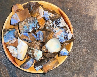 Boulder Opal rough from Quiplie, Queensland. stunning rough that will cut some outstanding stones. 100 gram parcels- high grade opal