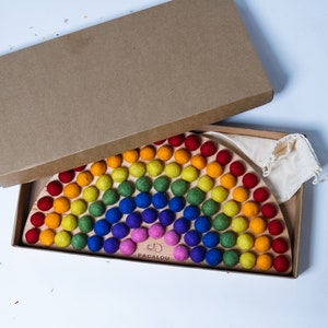 Wooden Montessori Rainbow toy for color learning sorting and matching activities with included wool felt balls