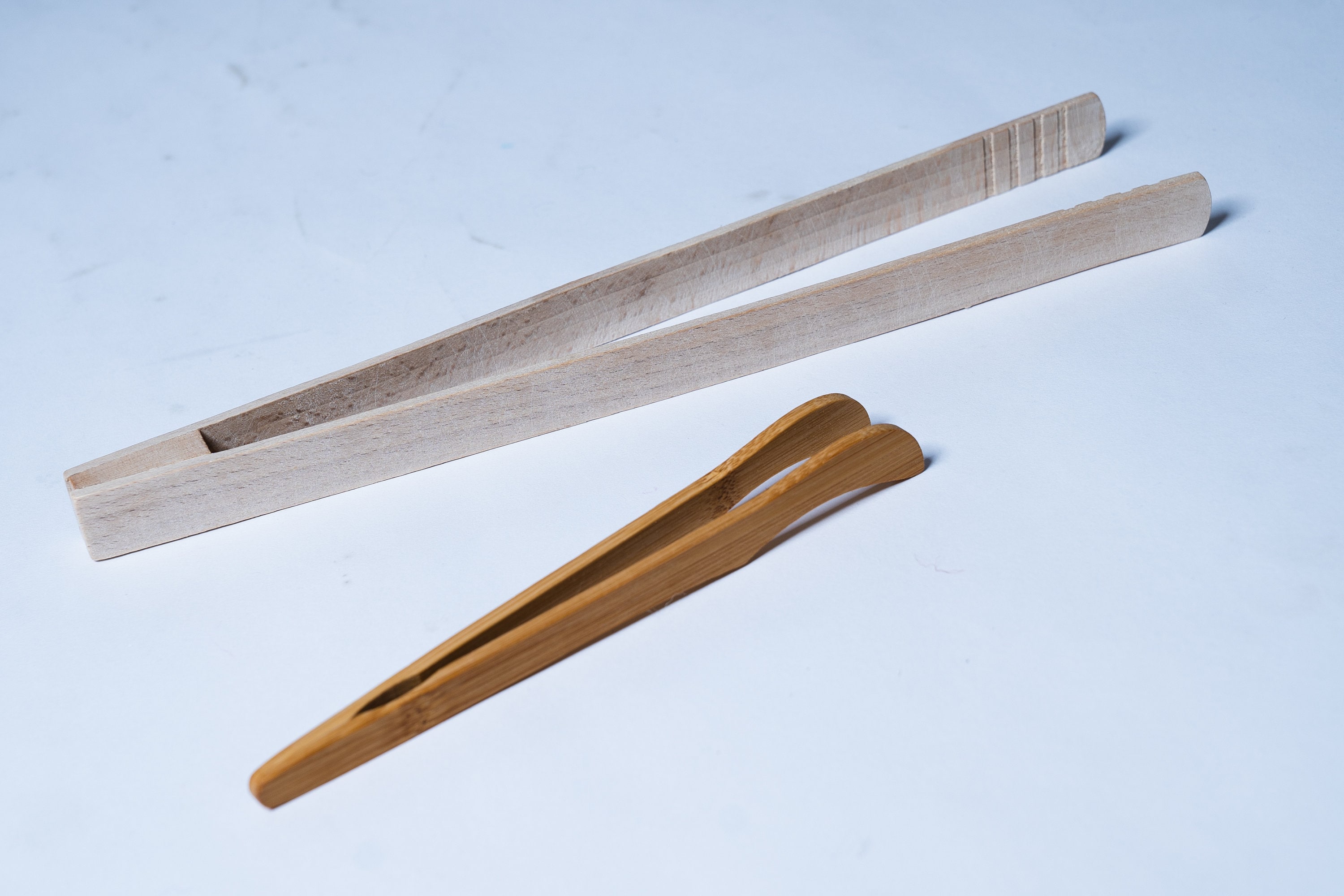 Wooden tweezers for heuristic and sensory bin tray. Wooden kitchen utensils. Wooden pincer. Open ended play toy