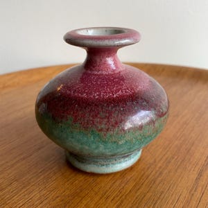 Vintage Trumpet neck Art Pottery Bud Vase, garnet red and green glaze, artist signed, star mark, Burgandy, wine, Sange de Beouf, flambé