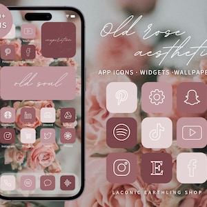 Pode incluir: Uma maquete de tela de telefone com um esquema de cores rosa e marrom. A tela exibe ícones de aplicativos com um design minimalista. O texto "Old rose aesthetic" está na parte superior da imagem. O texto "APP ICONS - WIDGETS - WALLPAPERS" está abaixo do título. O texto "LACONIC EARTHLING SHOP" está na parte inferior da imagem.