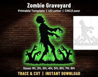 Puede incluir: Silueta negra de un zombi con los brazos extendidos y manos que emergen del suelo, con un brillo verde. El texto "Zombie Graveyard" y "Trace & Cut | Instant Download" son visibles. Tamaños de 30 cm a 244 cm.