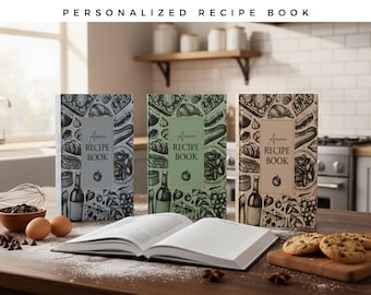 May include: Three personalized recipe books in blue, green, and beige, each featuring a black and white line art pattern of food items and the text Anna RECIPE BOOK. An open book lies in front, with a whisk, eggs, and chocolate chips nearby.