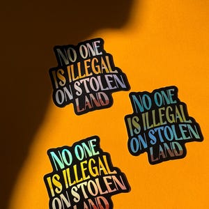 No One Is Illegal on Stolen Land Sticke / Pro-Immigrant / Decolonize / Queer-Made Holographic Sticker