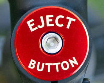 Legit Headset Caps brand custom headset cap for bicycle with laser etched "Eject Button" text, standard 1 & 1/8" size fits most bikes