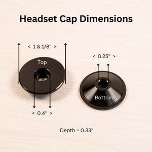May include: Black headset cap with dimensions labeled. The top cap is 1 1/8 inches in diameter, with a center hole diameter of 0.4 inches. The bottom cap is 0.25 inches in diameter. The depth is 0.33 inches. Text reads: Headset Cap Dimensions.