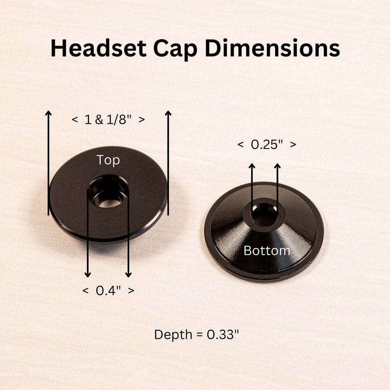 May include: Black headset cap with dimensions labeled. The top cap is 1 1/8 inches in diameter, with a center hole diameter of 0.4 inches. The bottom cap is 0.25 inches in diameter. The depth is 0.33 inches. Text reads: Headset Cap Dimensions.