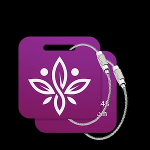 May include: Two purple luggage tags with a white floral design and silver wire loops. The tags have a rectangular shape with rounded corners and a slot at the top. The background is black.