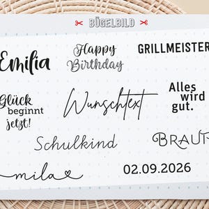 Könnte beinhalten: Ein weißer Bogen mit Bügelbildern in schwarzer Schrift, darunter Emilia, Happy Birthday, Grillmeister, Glück beginnt jetzt, Wunschtext, Alles wird gut, Schulkind, Braut, mila mit einem Herz sowie das Datum 02.09.2026.