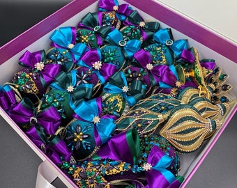 Set of Peacock christmas ornaments in gift box. Emerald Xmas bulbs with rhinestones. Purple Xmas baubles. Aqua blue icicles.Xmas tree topper