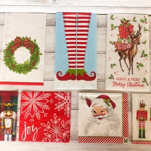 May include: Set of ten Christmas-themed paper napkins. The napkins feature various designs, including a wreath, elf legs, a reindeer carrying presents, snowflakes, Santa Claus, and nutcrackers.