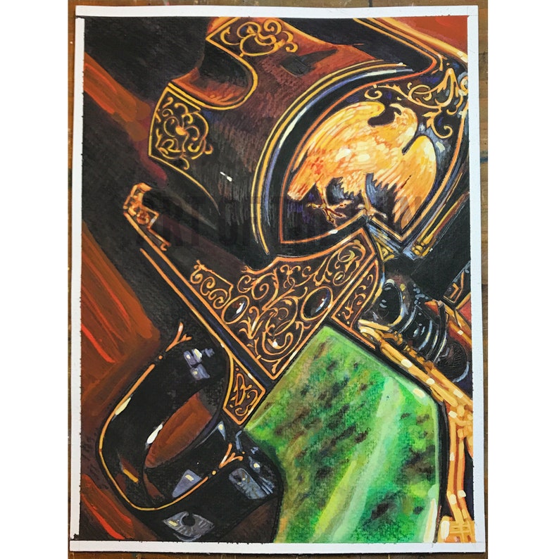 May include: A close-up of a detailed, ornate, black and gold firearm with a green and black background. The firearm has intricate carvings and an eagle design.