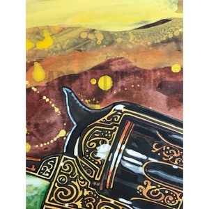 May include: Close-up of a black and gold revolver with intricate scrollwork. The gun is set against a backdrop of warm, earthy tones, with yellow and orange accents. The artwork has a vintage, Western theme.