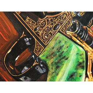 May include: Close-up of a black and gold handgun with intricate engravings. The handle is black and the barrel is green with a marbled pattern.