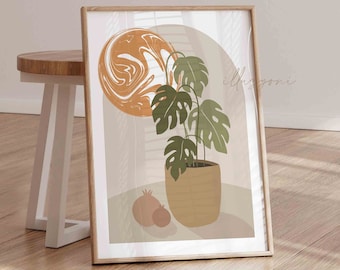 Puede incluir: Una impresión enmarcada con un diseño minimalista que presenta una planta en maceta con hojas verdes, dos pequeñas granadas naranjas y un gran círculo abstracto naranja y blanco en el fondo.