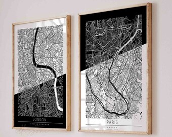 May include: Two black and white city maps in wooden frames. The top frame shows a map of Paris, France, and the bottom frame shows a map of London, United Kingdom.