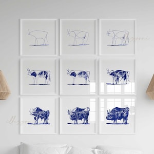 Puede incluir: Un conjunto de nueve impresiones enmarcadas que presentan dibujos de línea azules de toros. Las impresiones están dispuestas en una cuadrícula en una pared blanca.