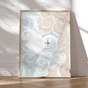 Puede incluir: Impresi&oacute;n de arte abstracto con un patr&oacute;n de remolino azul y beige. Una peque&ntilde;a silueta de avi&oacute;n vuela a trav&eacute;s del centro del dise&ntilde;o.