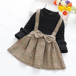 Girls dress outfit. Black taupe patterned/outfit/smart boutique clothing