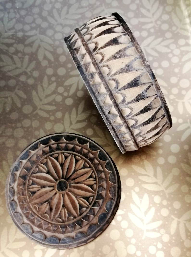 Hand made and tinted on the outer surface. Carved with flower and geometric pattern Unique Vintage Wooden Trinket Box