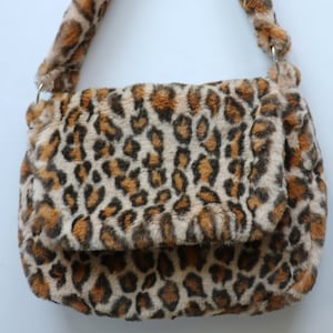 greeting card unif leopard bag