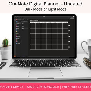 May include: A laptop computer displaying a digital planner in OneNote. The planner is in dark mode and shows a monthly overview with a calendar grid. The text "OneNote Digital Planner - Undated" and "Dark Mode or Light Mode" is displayed at the top of the screen. The text "Monthly Overview" is displayed above the calendar grid. The days of the week are labeled across the top of the calendar grid. The text "FOR ANY DEVICE | EASILY CUSTOMIZABLE | WITH FREE STICKERS" is displayed at the bottom of the screen.