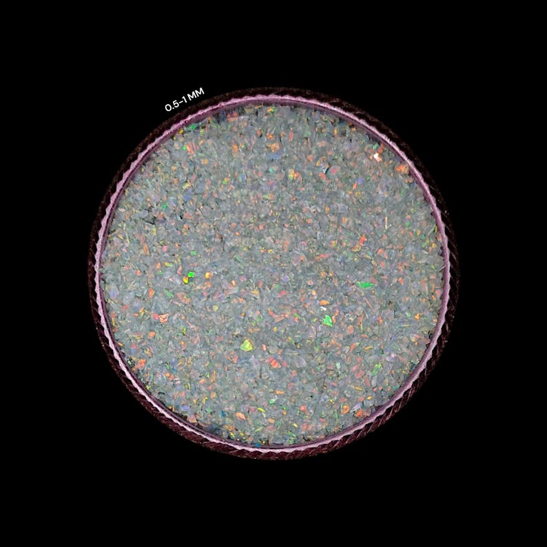 Our crushed White opal is completely prepared by handmade process, it will make your art more beautiful, its fire is very good, it is useful for making rings, woodworking and for resin art inlay and also for other types of workmanship can be used.