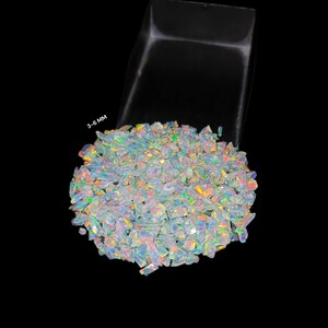 Our crushed White opal is completely prepared by handmade process, it will make your art more beautiful, its fire is very good, it is useful for making rings, woodworking and for resin art inlay and also for other types of workmanship can be used.