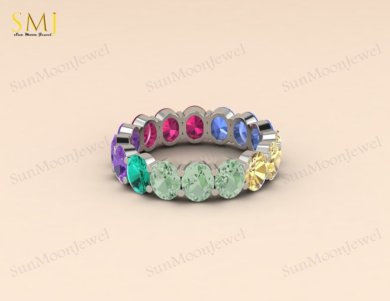 Multi sapphire oval shape wedding band featuring rainbow sapphires in 14k gold or sterling silver. 2