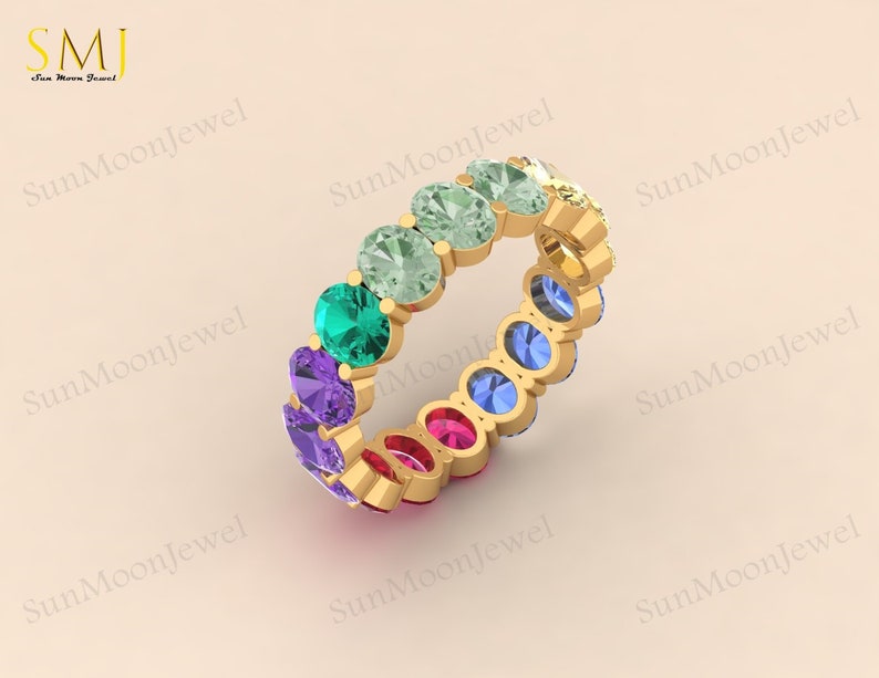 Multi sapphire oval shape wedding band with rainbow sapphires, available in 14k gold or sterling silver. 1