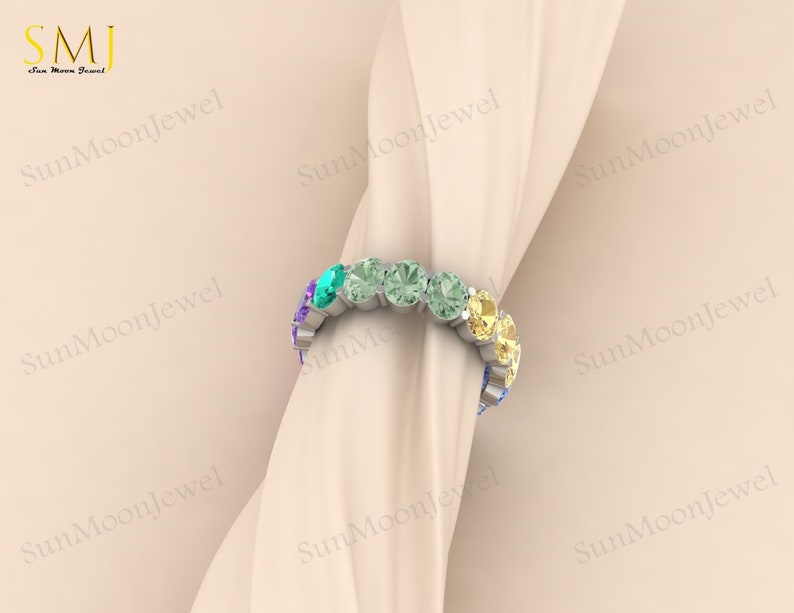 Multi sapphire oval shape wedding band with rainbow sapphires, available in 14k gold or sterling silver. 4