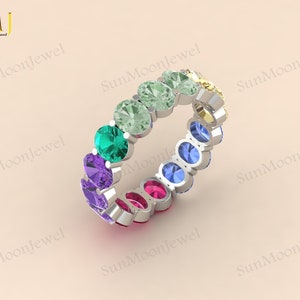 Multi sapphire oval shape wedding band featuring rainbow sapphires in 14k gold or sterling silver. 1