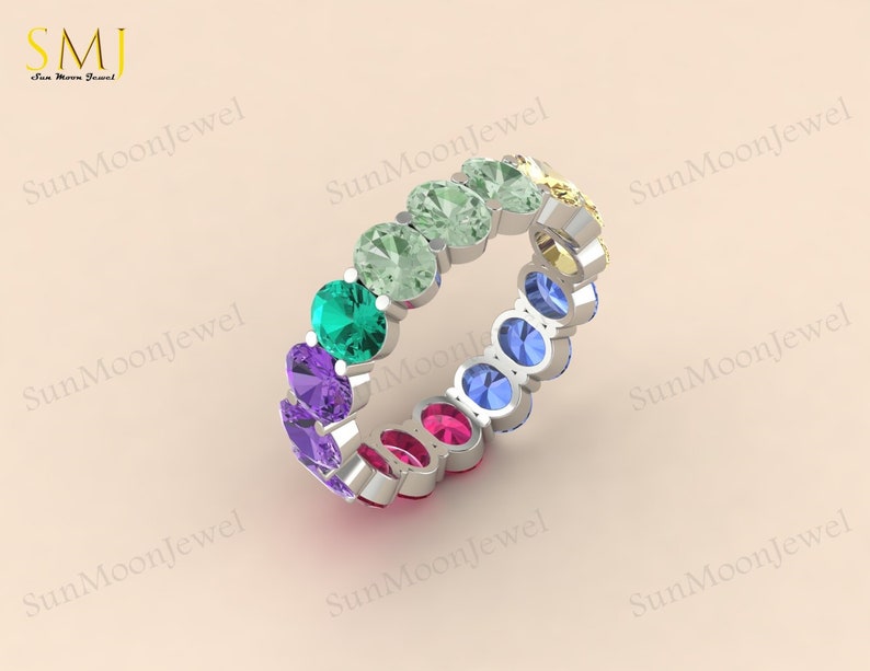 Multi sapphire oval shape wedding band featuring rainbow sapphires in 14k gold or sterling silver. 1