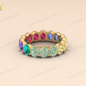 Multi sapphire oval shape wedding band with rainbow sapphires, available in 14k gold or sterling silver. 2