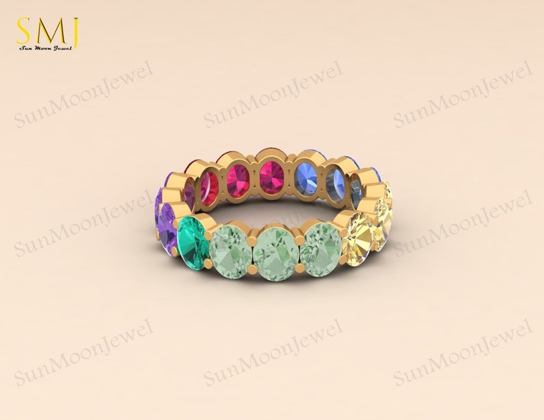 Multi sapphire oval shape wedding band with rainbow sapphires, available in 14k gold or sterling silver. 2