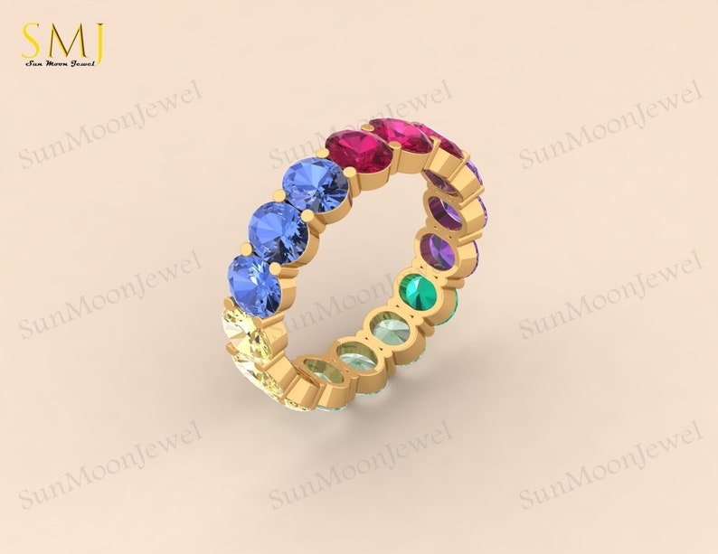 Oval-shaped multi sapphire wedding band featuring rainbow sapphires in 14k gold or sterling silver. 2